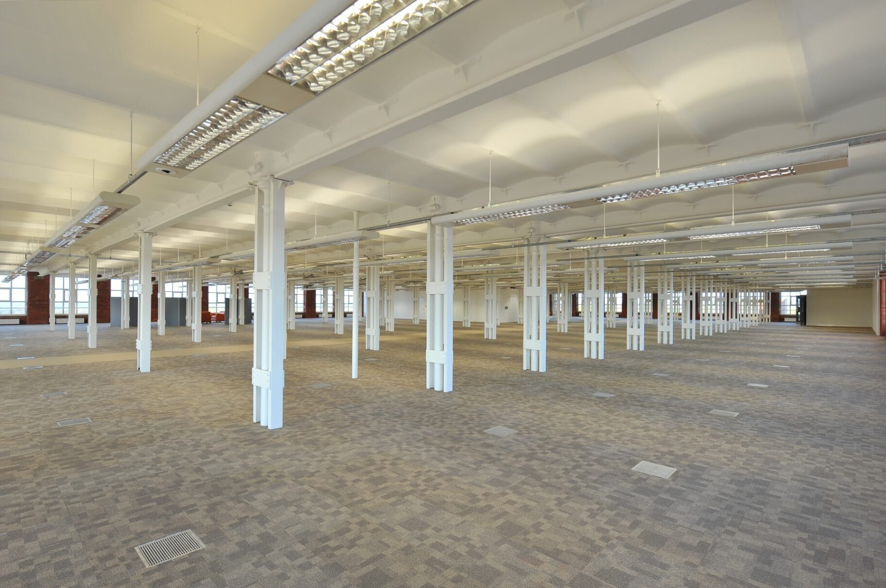 An open-plan, empty floor at Lowry Mill